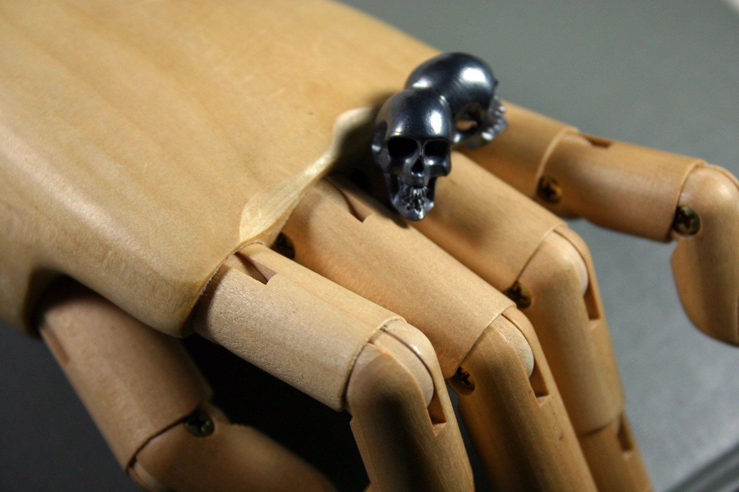 one of us. conjoined twin skull ring. sterling silver.