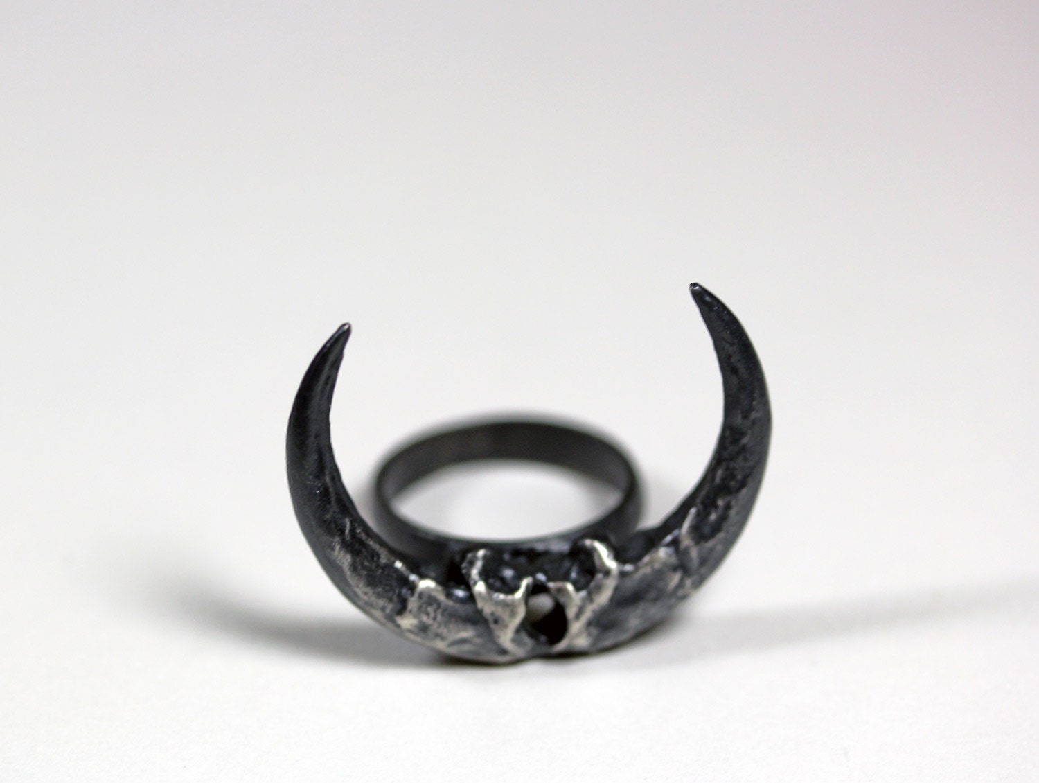 naja ring. owl talon crescent.