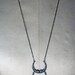 new moon. triple owl talon crescent necklace.