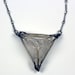 the crystal tomb necklace.