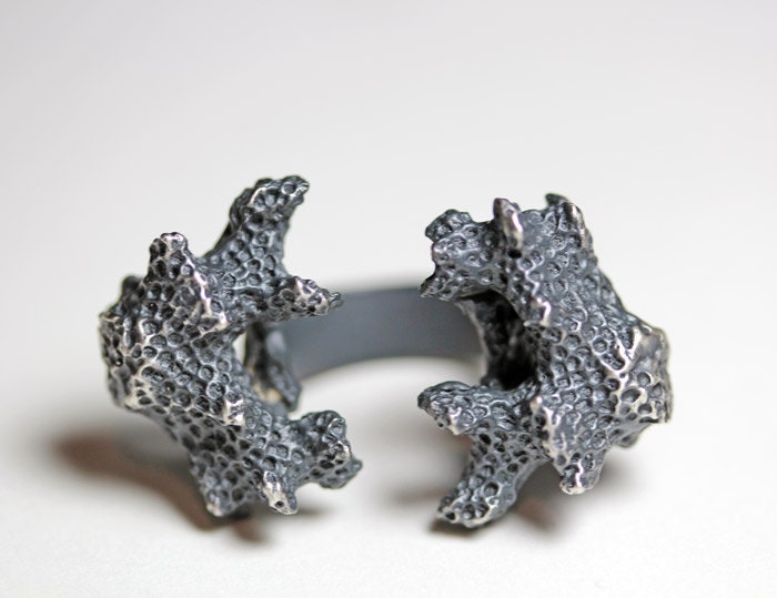 of his bones are coral made. twin coral ring.
