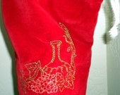 Embroidered lined wine bottle gift bag of red velveteen
