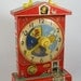 Vintage Fischer Price Music Teaching Clock Toy