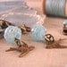 SNOWBIRD  necklace bracelet earrings set with vintage blue lampwork glass