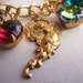 Holiday jewelry CHRISTMAS charm bracelet  vintage rhinestones green red