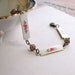 Shabby bracelet with vintage enamel roses and filigree