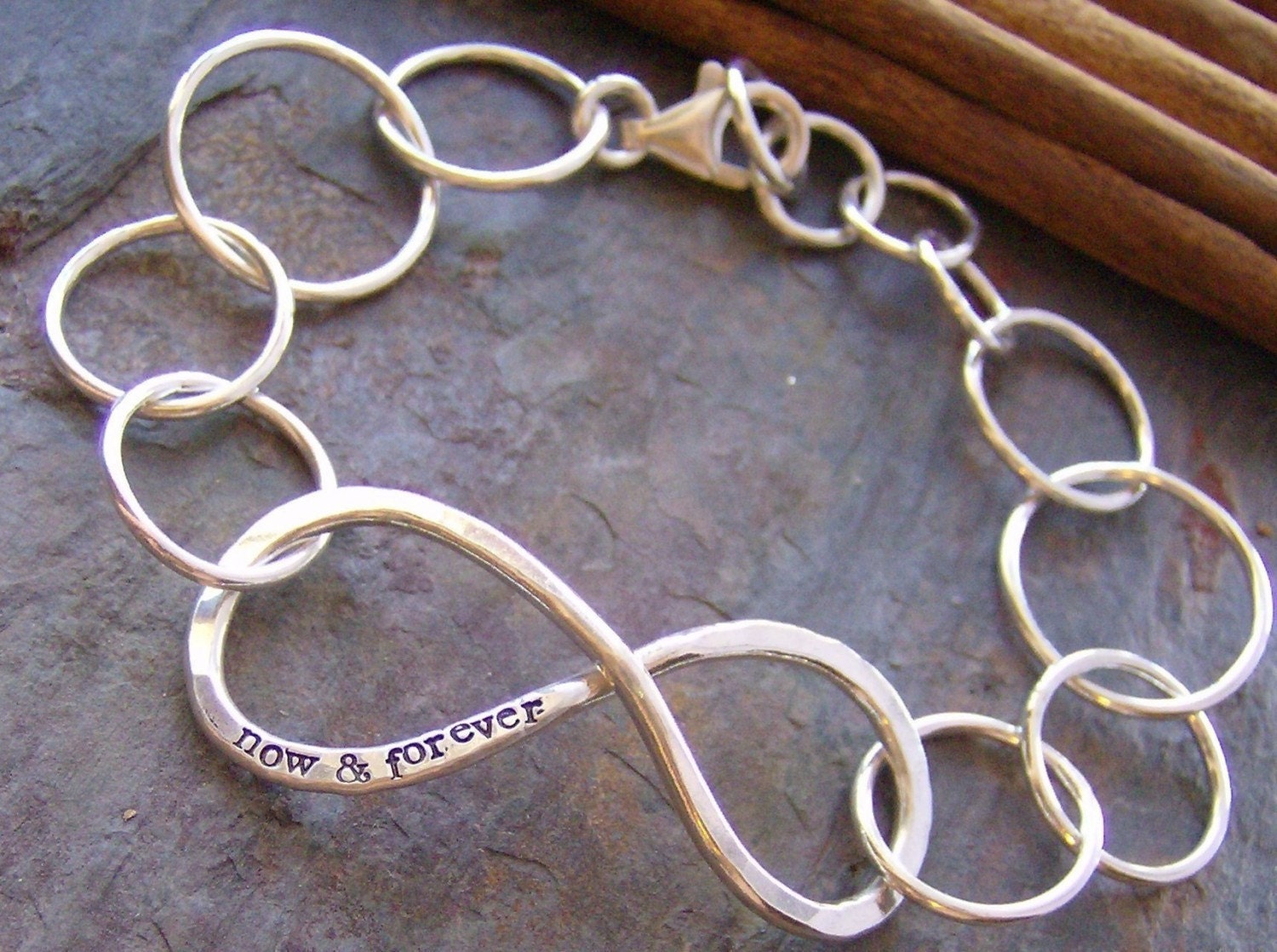 Infinite love.... hand forged and hand stamped fine silver infinity bracelet