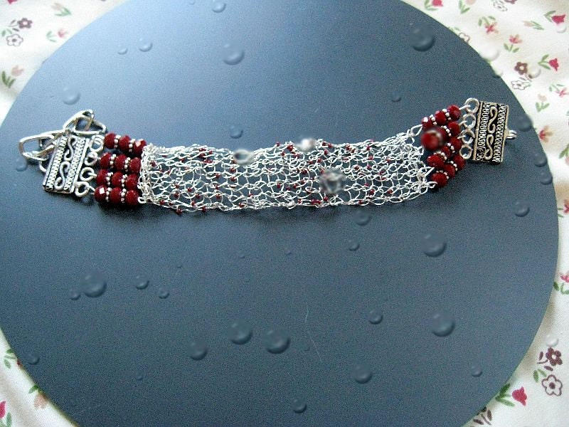 Knitted  wire bracelet in  sterling silver and red