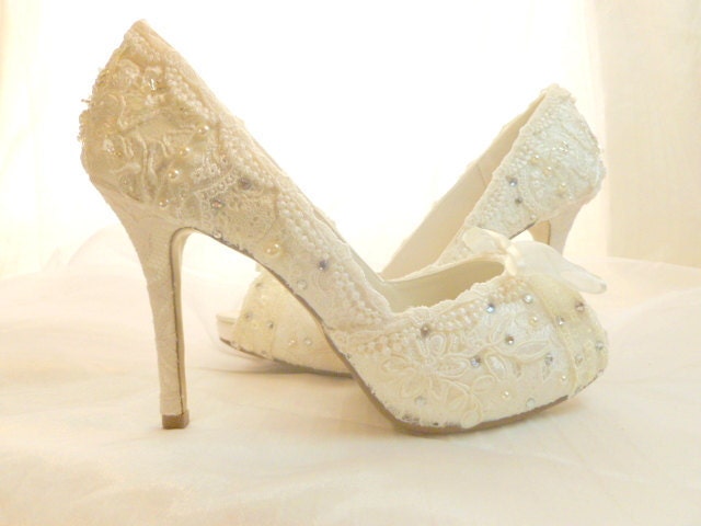 Lacey Ivory with Swarovski crystal and faux pearl adornments.  bespoke wedding shoes