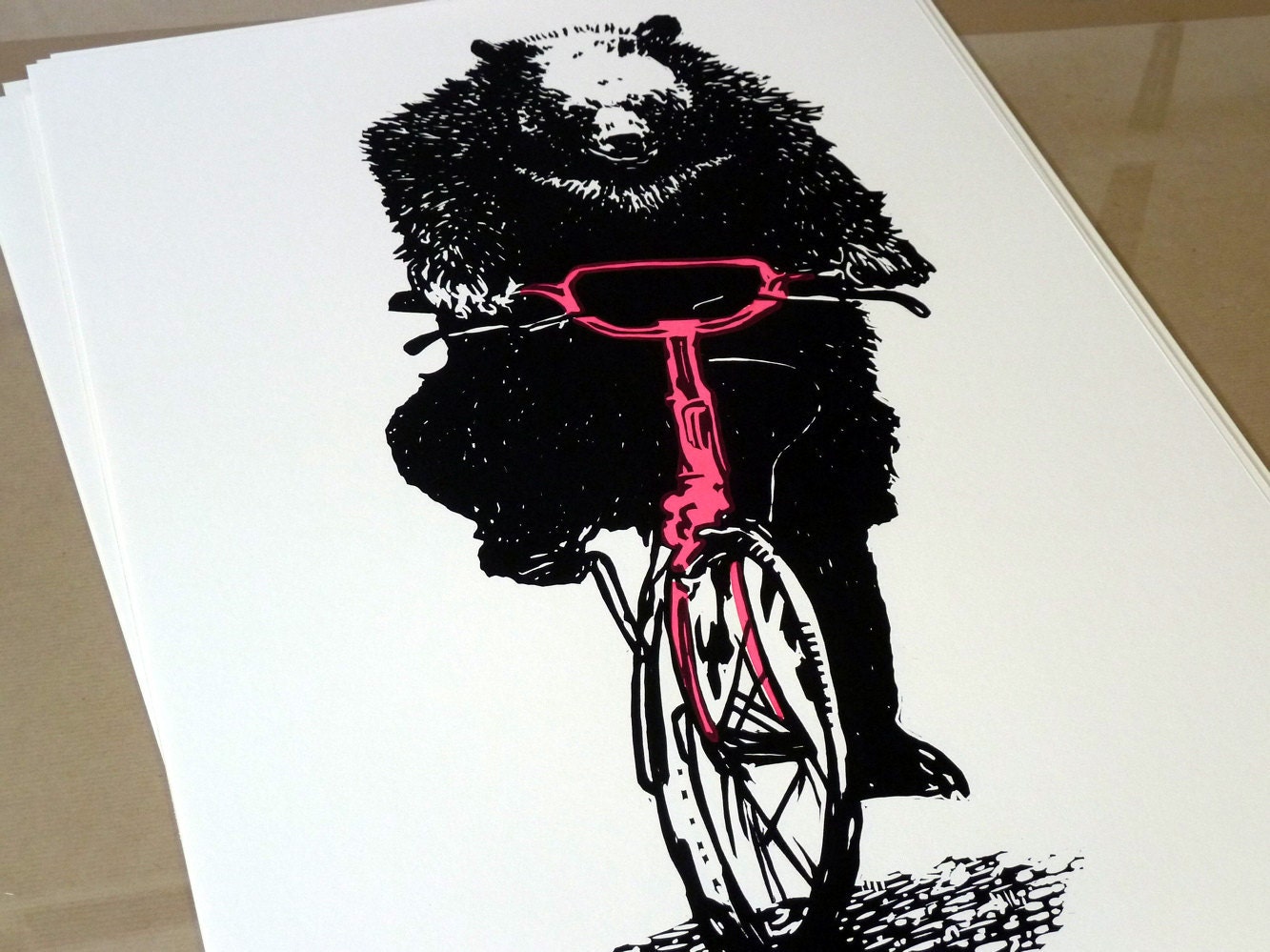 Bear on a Bike linocut print - dayglo pink