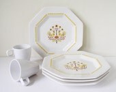 Vintage folk art dishes, plates, birds, yellow and brown