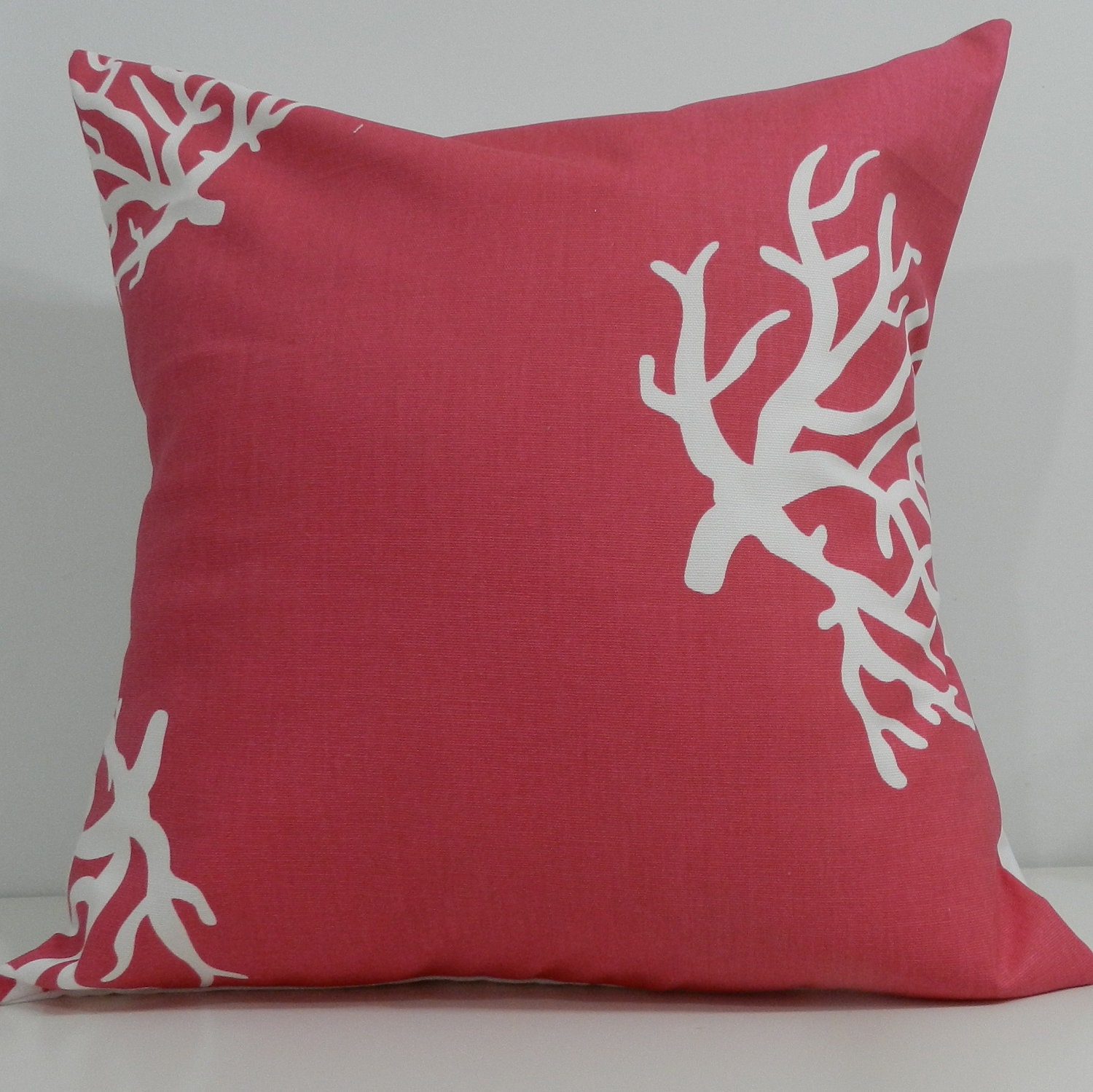 New 18x18 inch Designer Handmade Pillow Case in white coral on a pink background
