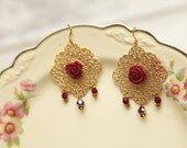 Elegant gold filigree earrings with red roses and swarovski crystals