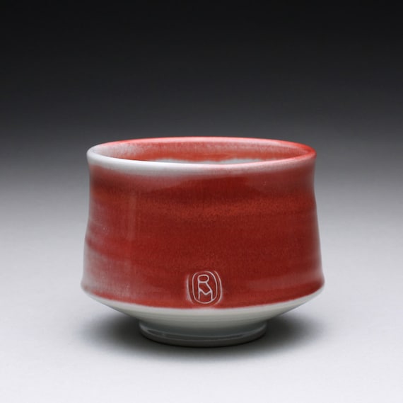 porcelain cup, chawan, tea bowl with bright red and turquoise celadon glazes