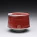 porcelain cup, chawan, tea bowl with bright red and turquoise celadon glazes