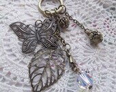 Necklace..boho.vintage gold..long chain and charms