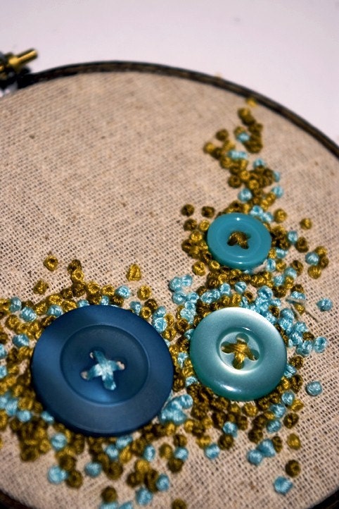 button growth embroidered wall hanging