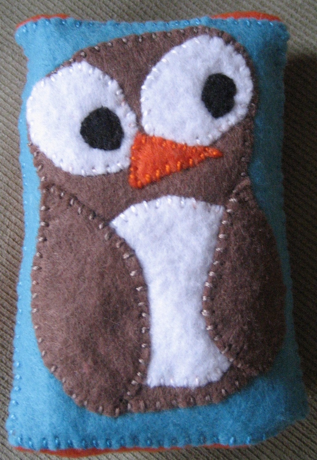 Brown Owl on Turquoise Background on Orange Tissue Cozy