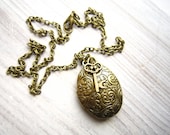 Colette Vintage Oval Locket with Key Charm in Brass