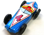 60s Mini tin toy race car in blue, from Japan.
