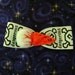 EyeBall Hair Bow On White Skull Ribbon says "absolutely dangerous"