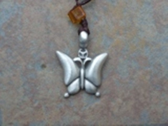 brown chinese silk cord necklace w.silver butterfly pendant