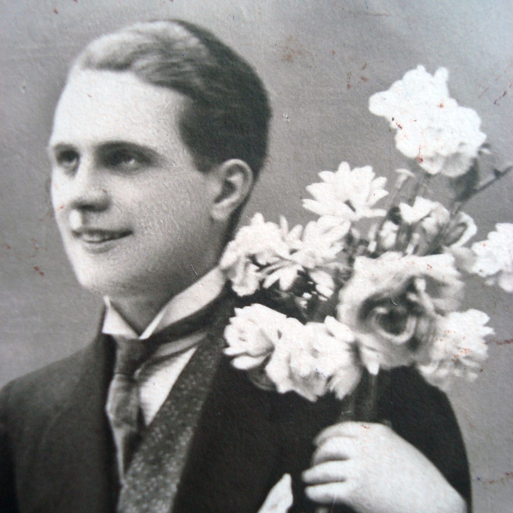 FOUND IN SPAIN --- Portrait of a young gentleman with flowers