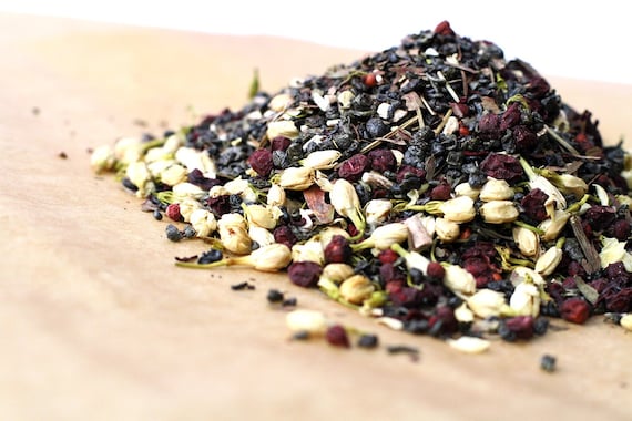 a fruity tart green tea blend . loose leaf