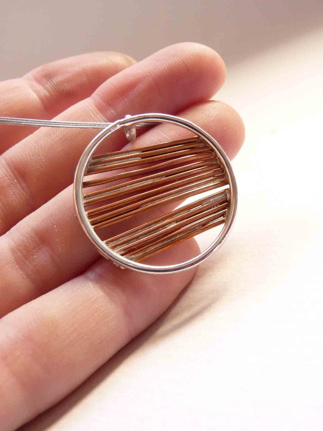 Necklace round of an inch, copper and sterling silver Asymmetrical sticks. Minimalist design, simple to use all day
