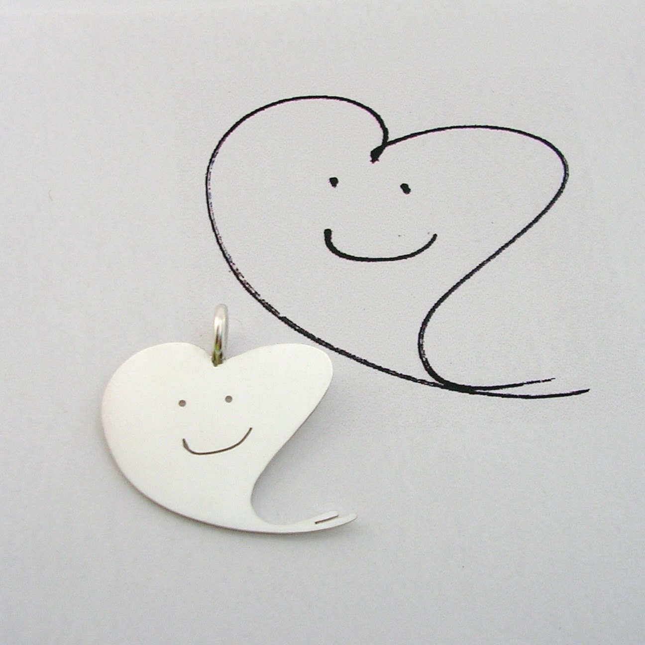 Your childs heart drawing on jewelry