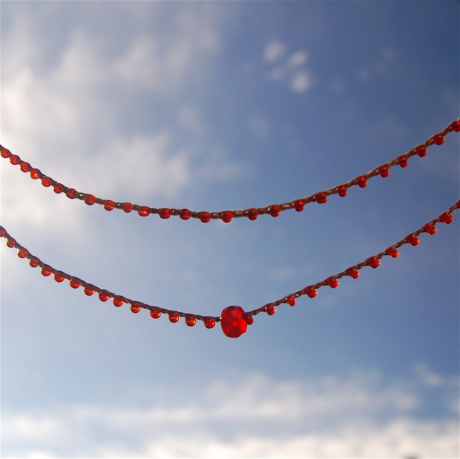 Infinity: simple claspless crocheted necklace in red