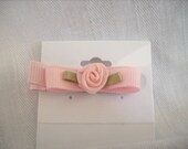 Pink tuxedo bow accented w/single pink rose