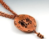 Double Nut Pendant