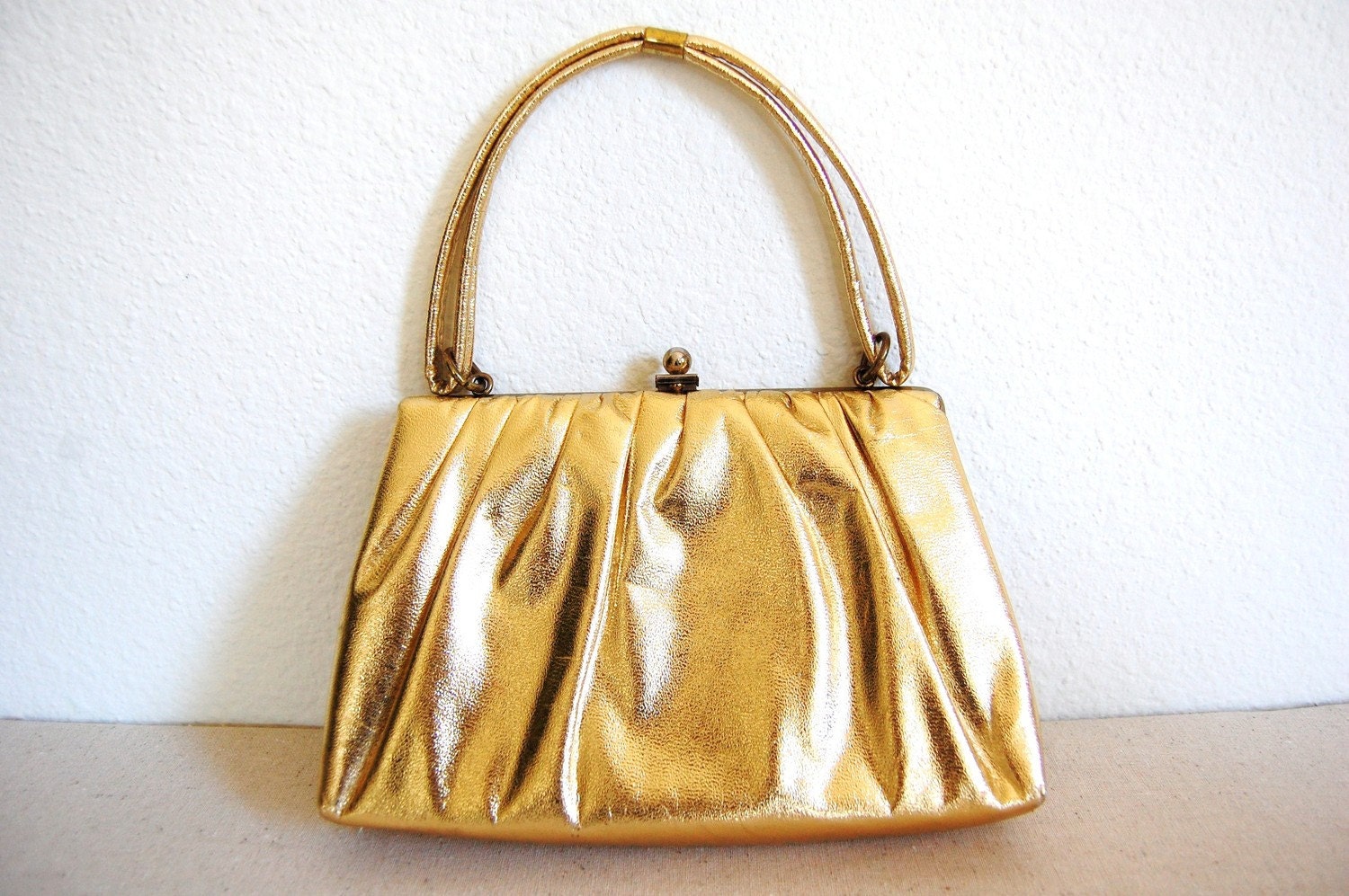 Vintage Shiny Gold Handbag with handle and clasp