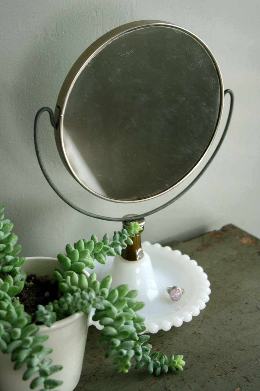 vintage milk glass mirror.