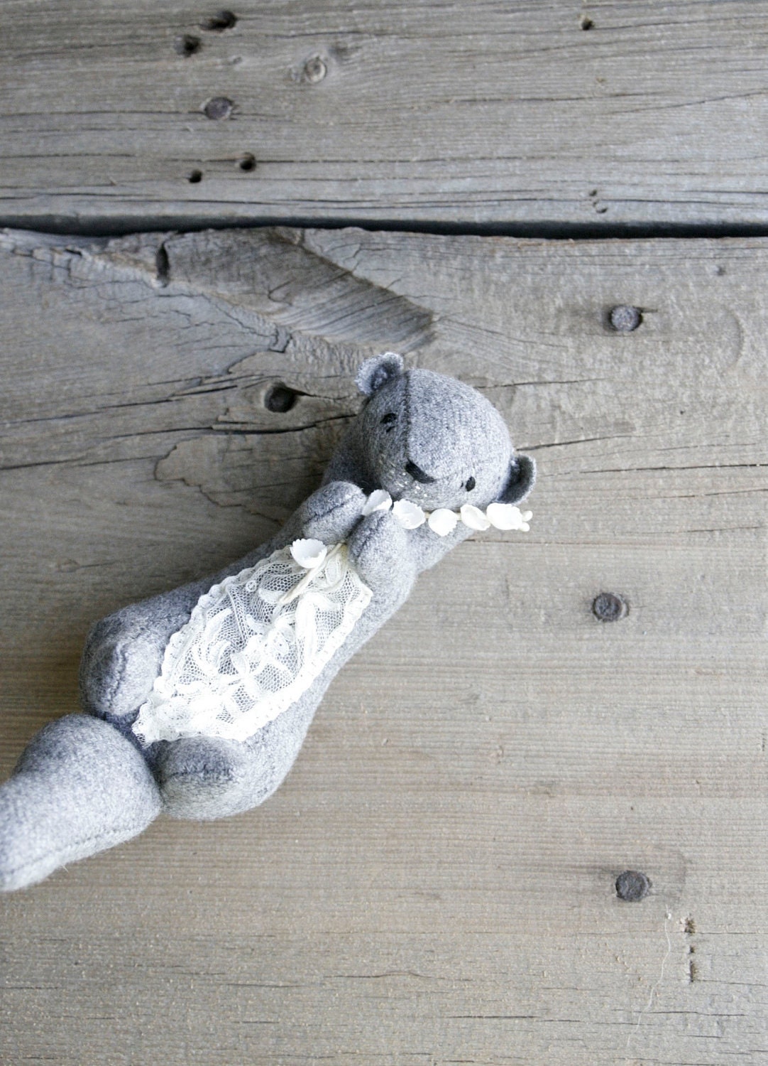 river otter gathering flowers / soft sculpture animal