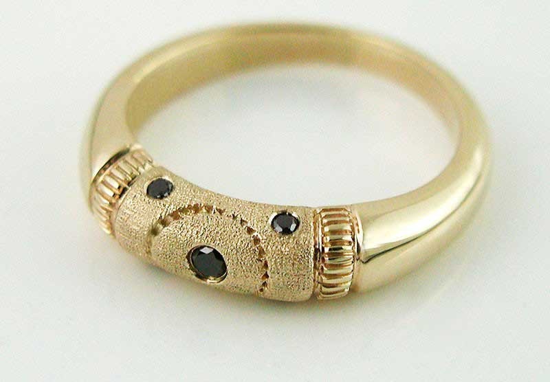 Wedding Ring in textured, hammered gold with black diamonds. Made to order, needs three weeks to complete.