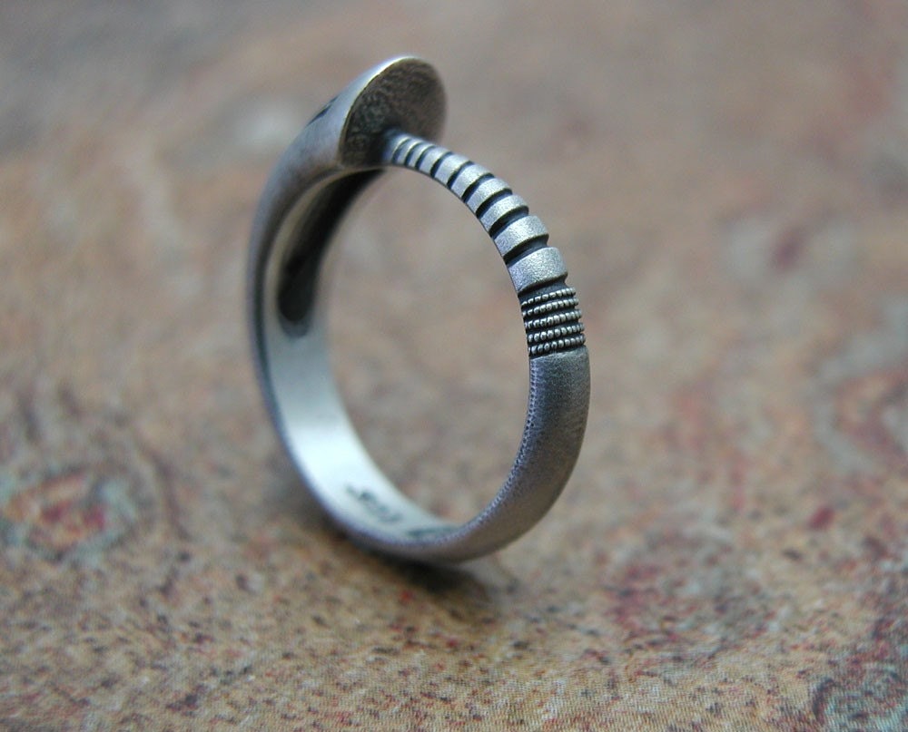 Ouroboros Ring, contemporary design, in textured, hammered and oxidized silver. Made to order, needs three weeks to complete