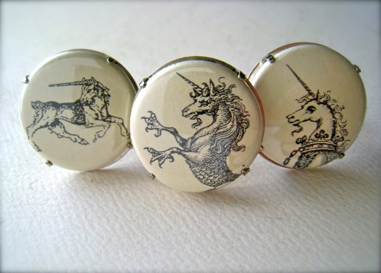 unicorn ring - flat button cab of black and white mythic beast