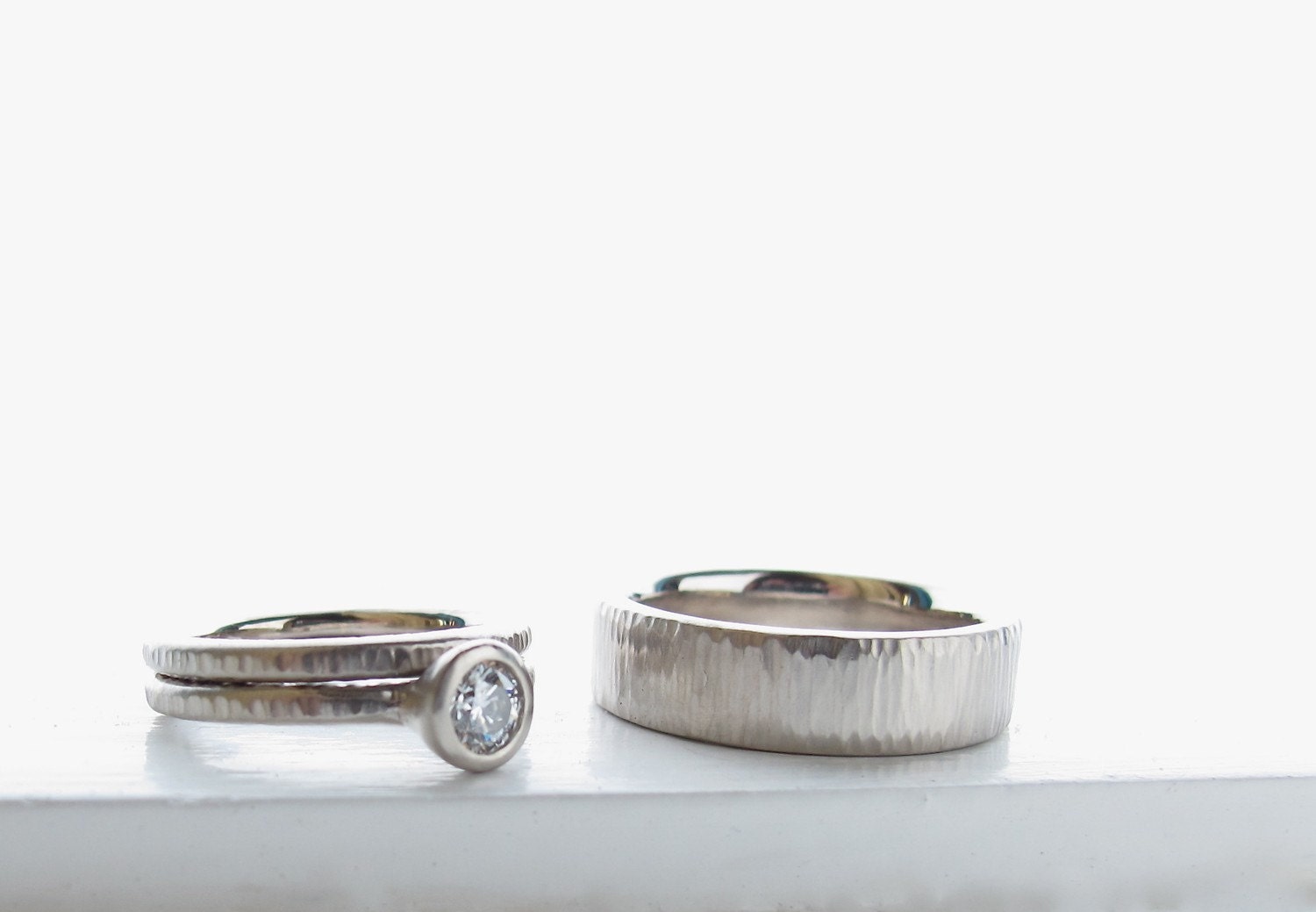 Diamond Pacific Ring his and hers engagement ring and matching wedding bands