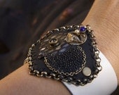 Wide Black and White Leather Alien Elements Steampunk Cuff Bracelet with stingray leather python and meterotie