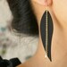 Black Metal Feather Earrings, Drop earrings, Statement earrings, 14kt gold filled chain tassel rice pearls cascade earrings