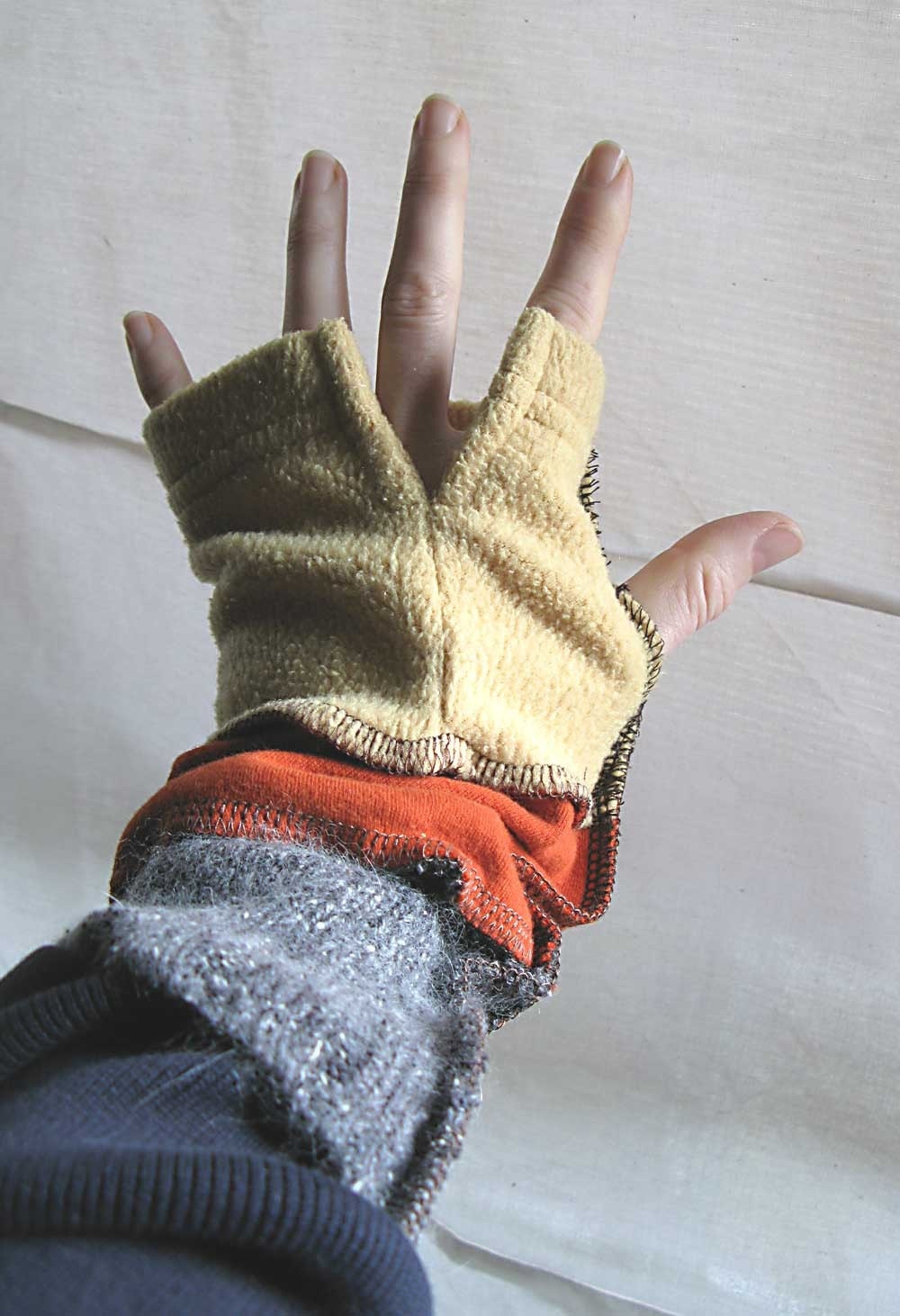 yellow, orange and grey arm warmers