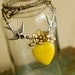 a delicate tattoo - vintage enamel flower and yellow glass heart necklace on brass chain