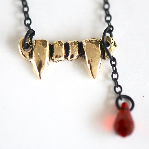 gold vampire fang - swarovski crystal - black necklace