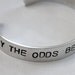 The Hunger Games May the Odds Custom Silver Metal Cuff Bracelet