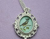 Crown Bird Pendant Necklace in Fancy Silver Tone Bezel