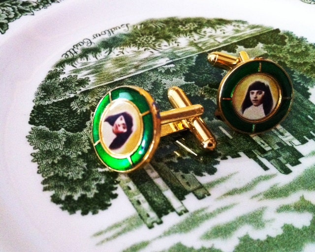 Green enamel cuff links, religious theme