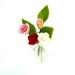 Miniature flowers, Sweet Roses, Mini Bouquet in clear glass bottle