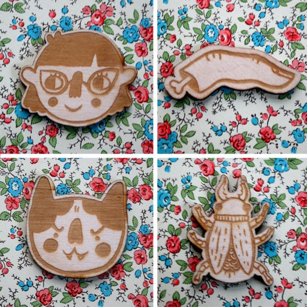 Finger, Girl, Cat, or Beetle Brooch